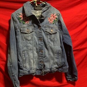 #188 size 1 Torrid Blue Denim Jacket w/Embroidery on front & back